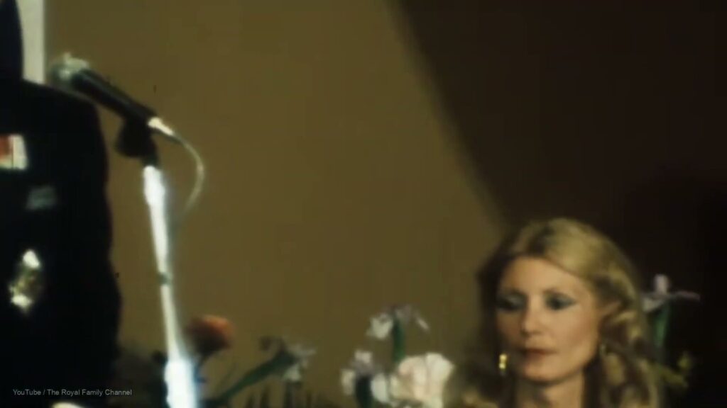 At the microphone, an early speech