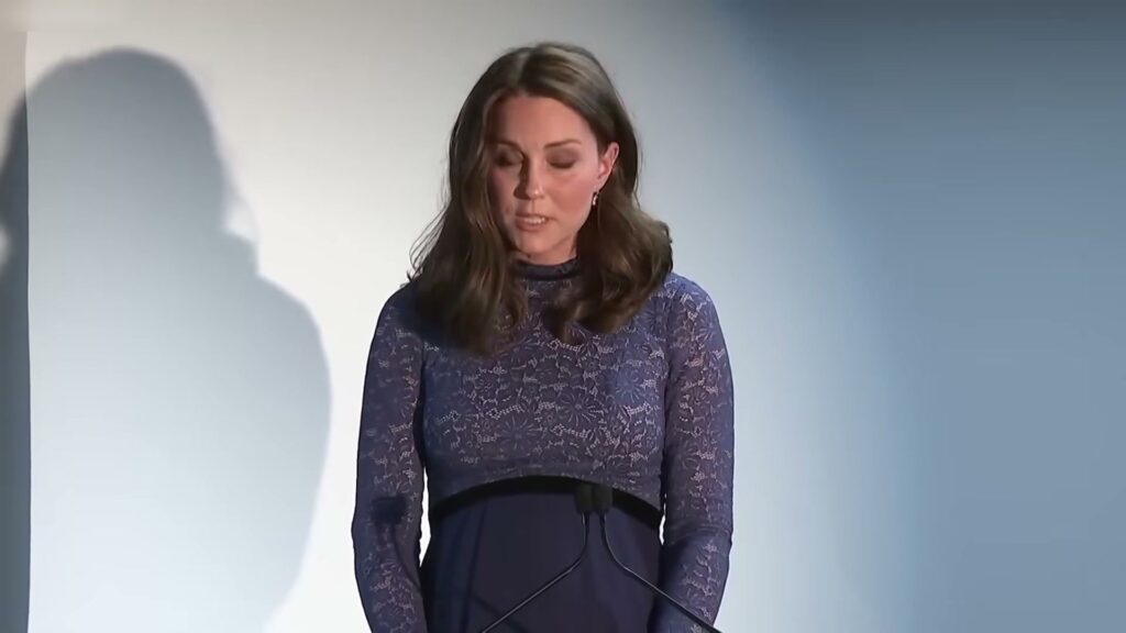 At the lectern, a short speech